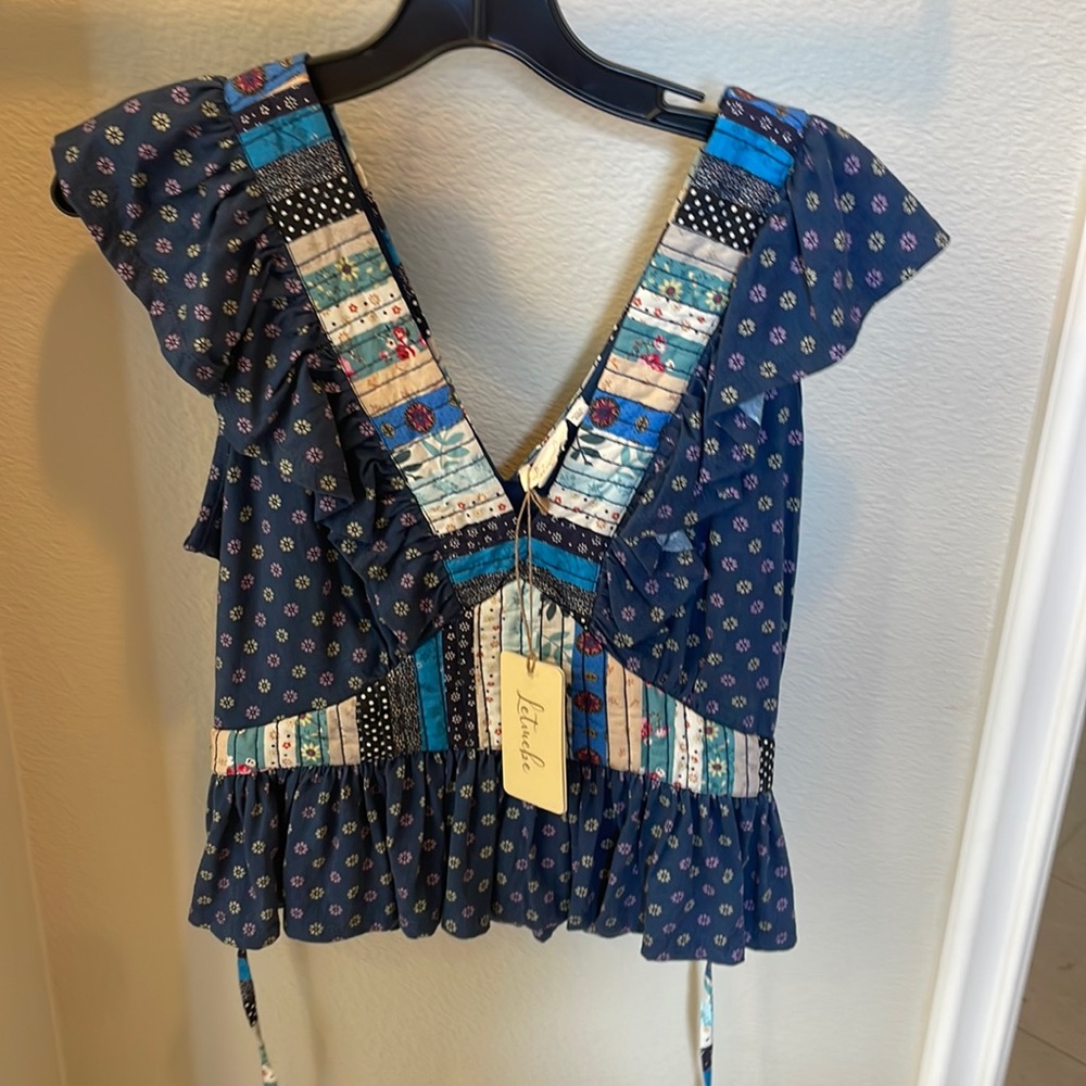 Anthropology top with tags never worn